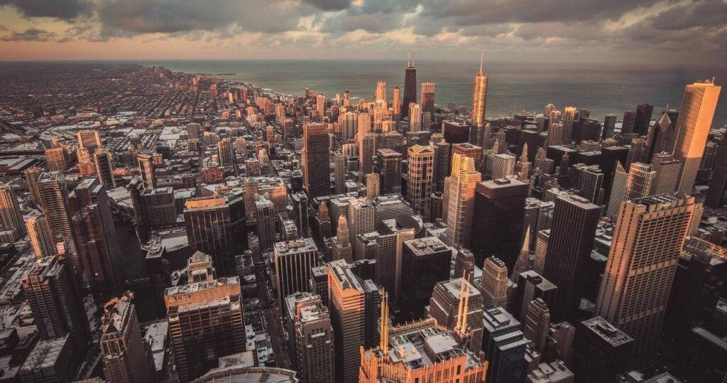 an aerial view of chicago during sunset