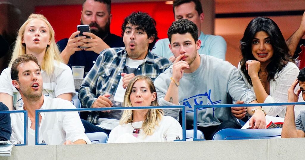 Sophie Turner Joe Jonas Nick Jonas and Priyanka Chopra in the crowd at a tennis match