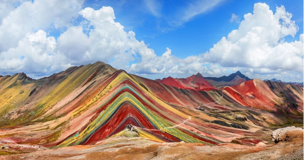 hiking up rainbow mountain, peru