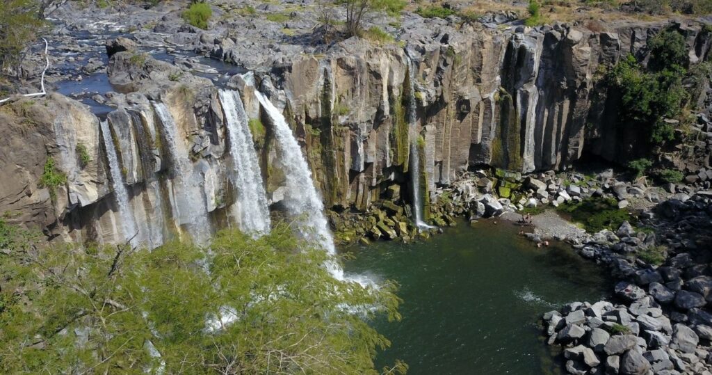 a view above the los amates waterfall in guatemala