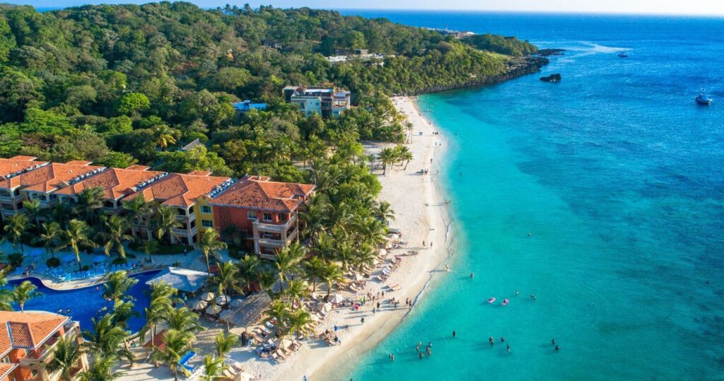 an aerial view of a beach in honduras