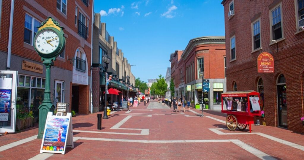 a brick street with shops in salem, ma